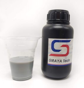 Image of Siraya Tech Photopolymer resin bottle and cup half filled with 3d printer resin